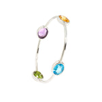 Blue topaz, Peridot, Amethyst and Citrine Bangle in white gold